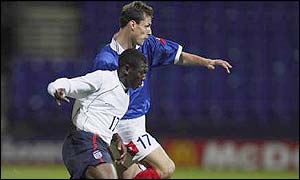 Wright-Phillips in action against the Yugoslavs