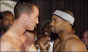 Woods (left) and Jones face each other at the weigh-in