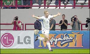 Vladimir Beschastnykh celebrates after scoring Russia's second goal