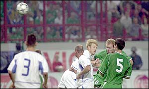 Ireland substitute Gary Doherty heads the ball into the net 