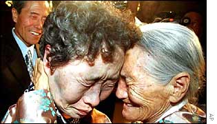 Two sisters are reunited for the first time in half a century in August 2000
