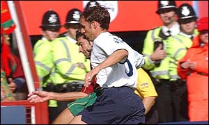 Gareth Southgate polices Portugal's Luis Figo