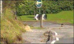 Damaged road to roundabout