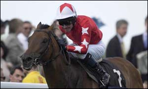 Rock of Gibraltar, ridden by Mick Kinane, wins the 2002 Prix du Moulin at Longchamp