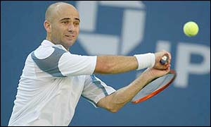 Agassi breaks Sampras in the last game of the third set to take it 7-5 