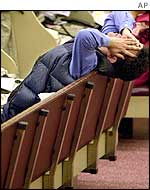 Trader with head in hands