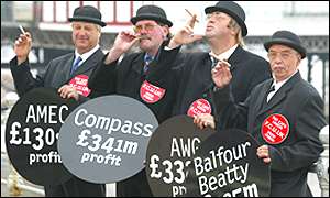 Union activists dressed as wrecking balls in a PFI protest