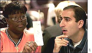 Volunteers manually recount votes in the Florida, 2000