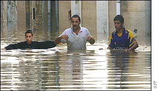 Villagers wade through Aramon floods