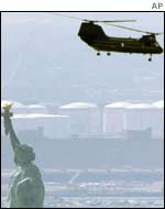 US helicopter flies past New York's Statue of Liberty