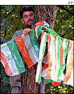 Congress worker with flags