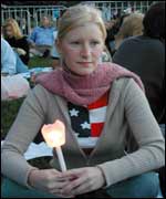 New Yorker Tuesday Burns holds a candle in Central Park