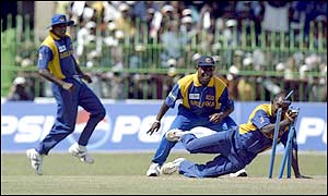 Gunaratne's sharp reflexes see Yousuf Youhana dismissed from the first ball he faced