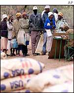 People queuing to receive food aid