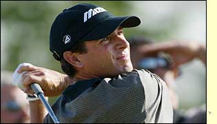 Bill Andrade follows the flight of a shot