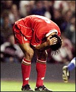 Chris Coleman hangs his head in a European Championship loss against Italy in 1998
