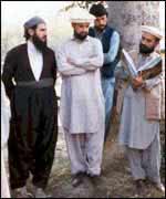Mullah Krekar with three other men