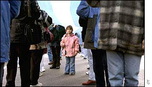Child at a protest in Buenos Aires