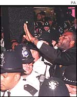 Protesters outside Hannibal House, where five Lawrence murder suspects - none ever convicted - went to answer questions at the inquiry