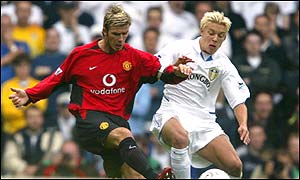 Beckham attempts a cross-field pass at Elland Road