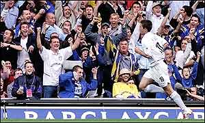 Kewell celebrates his goal with the Leeds fans