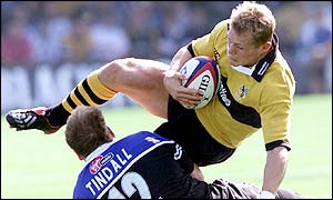 Mike Tindall brings down Josh Lewsey