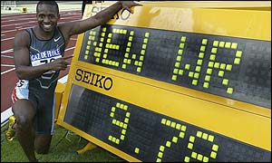 Tim Montgomery sets a new world record time of 9.78