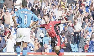 David Thompson celebrates scoring in the Lancashire derby