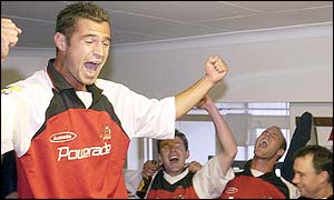 Glamorgan's Darren Thomas leads the celebrations