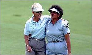 Nancy Lopez (right) gets a hug from Patty Sheehan of USA 