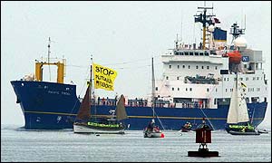 Nuclear cargo ship is met by flotilla of protesters