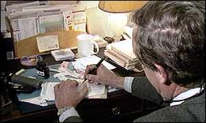 GP writing prescription