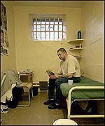 Inmate inside his cell