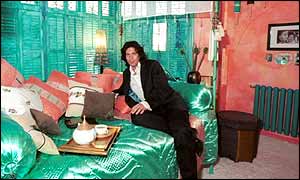 Laurence Llewelyn-Bowen in a room after its makeover on Home Front 