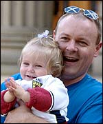 Tartan Army member with daughter