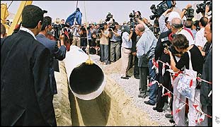 The pipe enters the trench