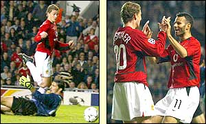 Solskjaer is embraced by team-mate Ryan Giggs after scoring United's second goal