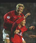 Beckham shares Forlan's joy