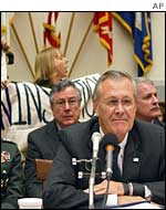 Protestors disrupt Mr Rumsfeld's testimony