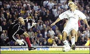 Alan Smith fires home a cross from the returning Michael Bridges