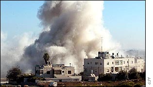 Smoke billows from Yasser Arafat's Ramallah compound
