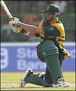 Graeme Smith goes for a slog-sweep