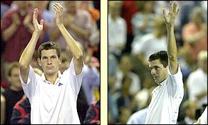 Tim Henman salutes the crowd at Birmingham's National Indoor Arena after fighting back from a set down to give Britain victory in the opening match