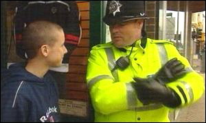 Policeman talks to a youth in north Wales
