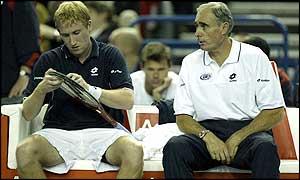 GB captain Roger Taylor talks to Martin Lee during a changeover