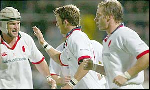 Try-scorer Bryn Cunningham is congratulated by Ulster team-mates.