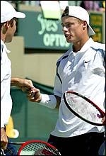 Lleyton Hewitt (right) with doubles partner Todd Woodbridge
