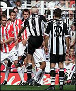 Shearer fires though the wall to score