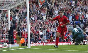 Liverpool's Milan Baros heads in a Steven Gerrard cross