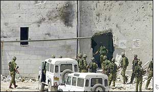 Israeli troops enter the main office building 